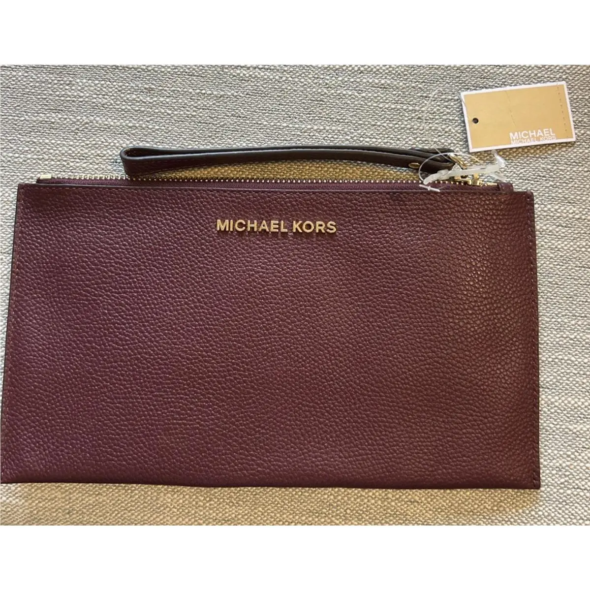 Michael Kors Pebbled Leather Burgundy Wristlet ID Card Holder