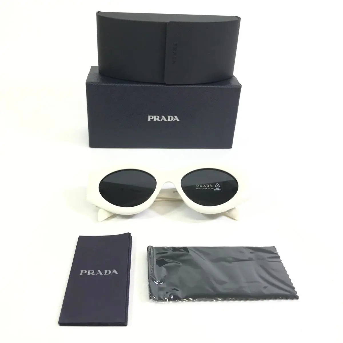Prada Sunglasses Spr 20Z 142-5S0 Polished White Oval Frames w/ Dark Gray Lenses