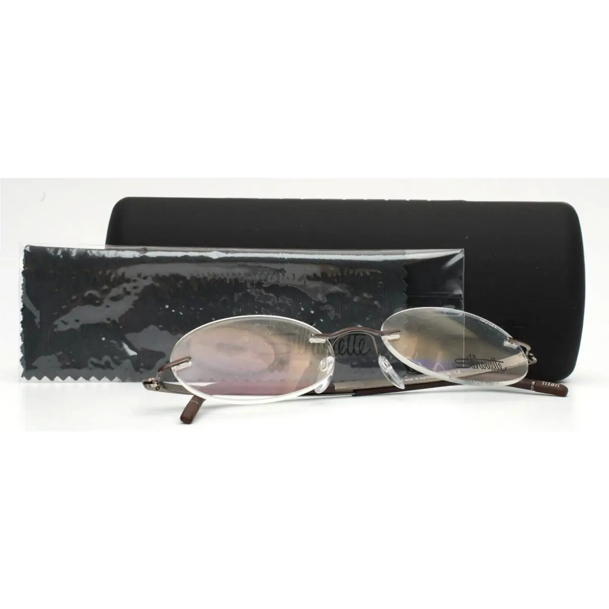 Silhouette 5529 GA 6060 Brown Unisex Oval Rimless Eyeglasses 52-19-145 B:35.8