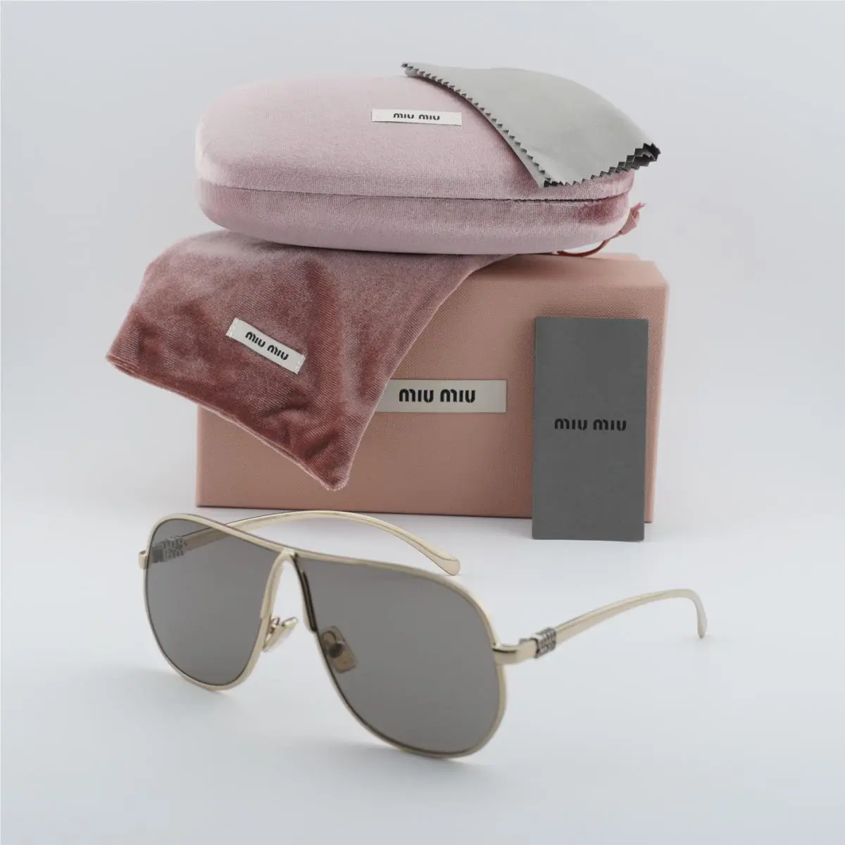 Miu Miu MUA56S ZVN80Q Pale Gold/dark Grey 66-02-140 Sunglasses