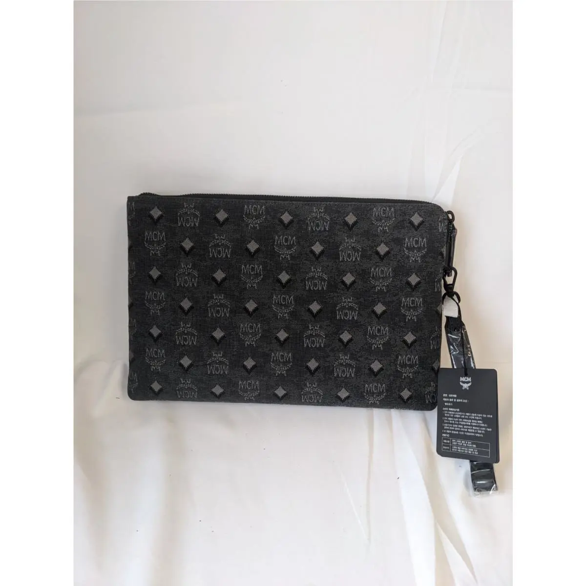 Mcm Women Standing Wristlet Pouch In Vintage Monogram Jacquard Black Medium