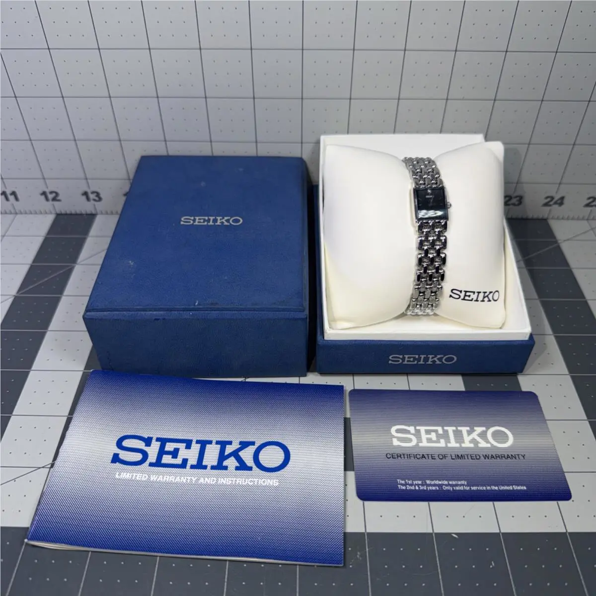 Seiko SYL795 Silver Tone Stainless 1F20-0AH0 W/gemstone Sample Watch W/ Box