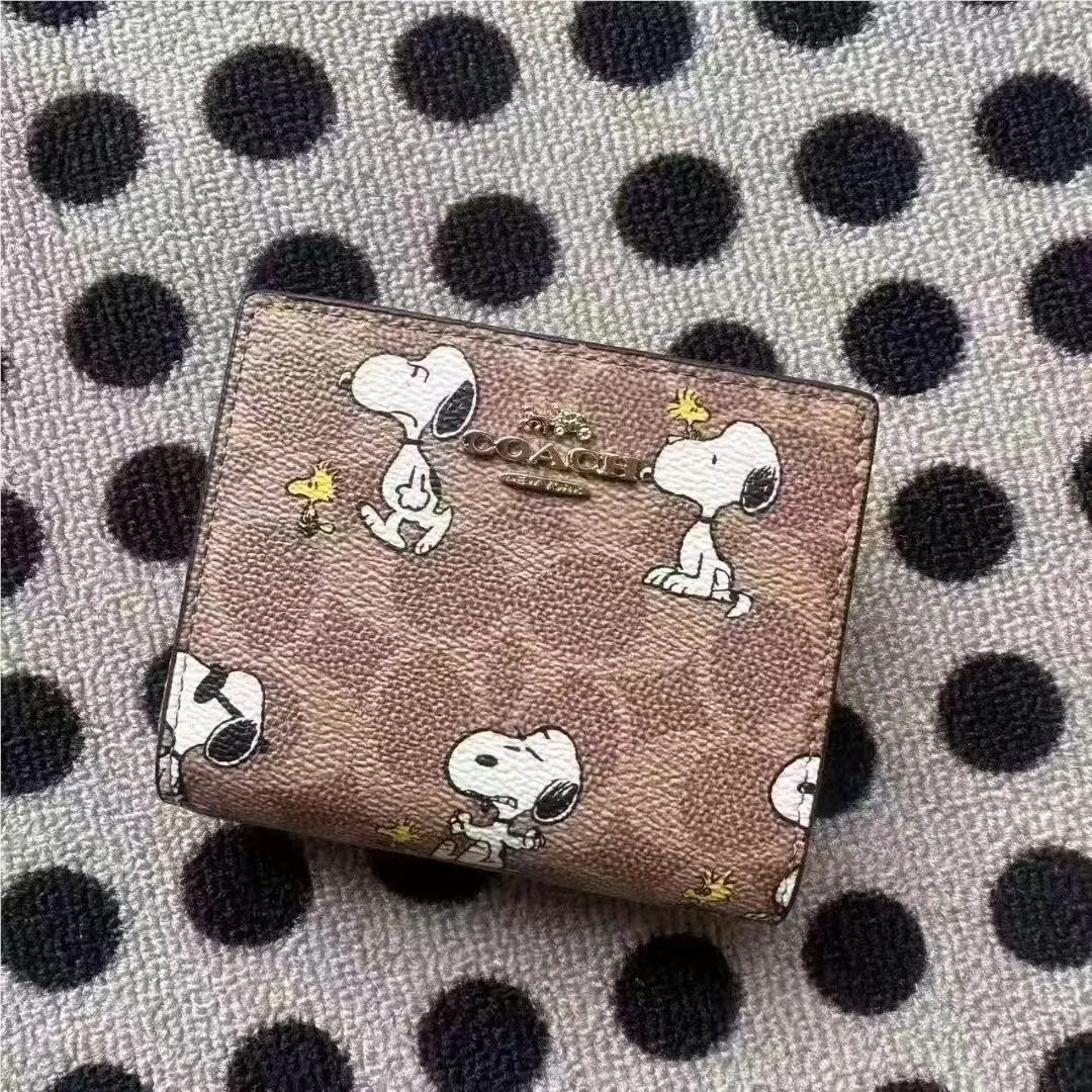 Coach X Peanuts Snap Wallet In Signature Canvas with Snoopy Print CBN32