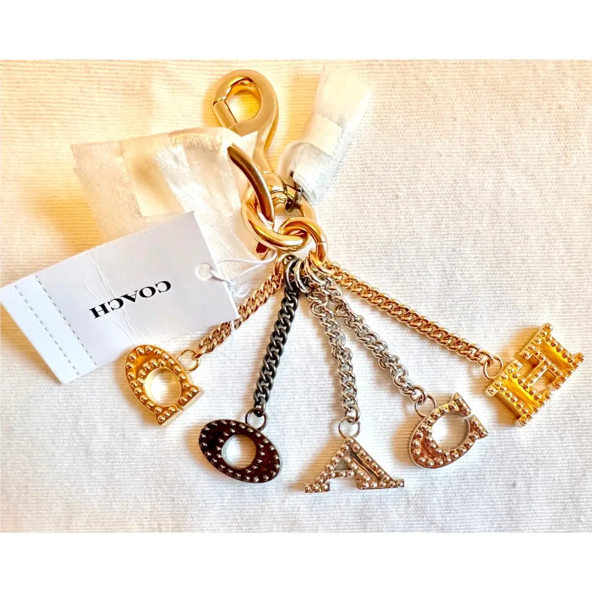 Multicolor Perforated  Letters Metal Keychain /bag Charm 91474 by Coach