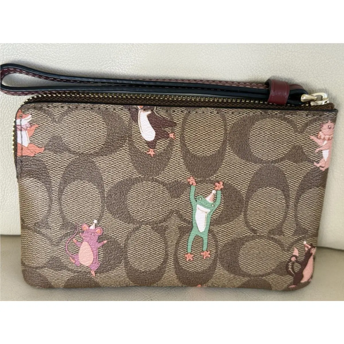 Coach Animal Corner Zip Wristlet