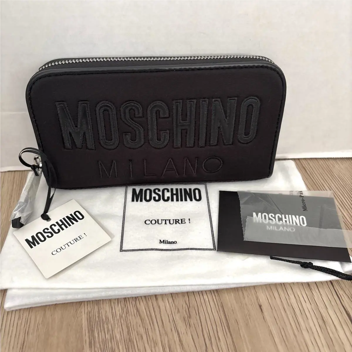 Moschino Black Logo Zip Around Quilted Wallet with Silver Hardware
