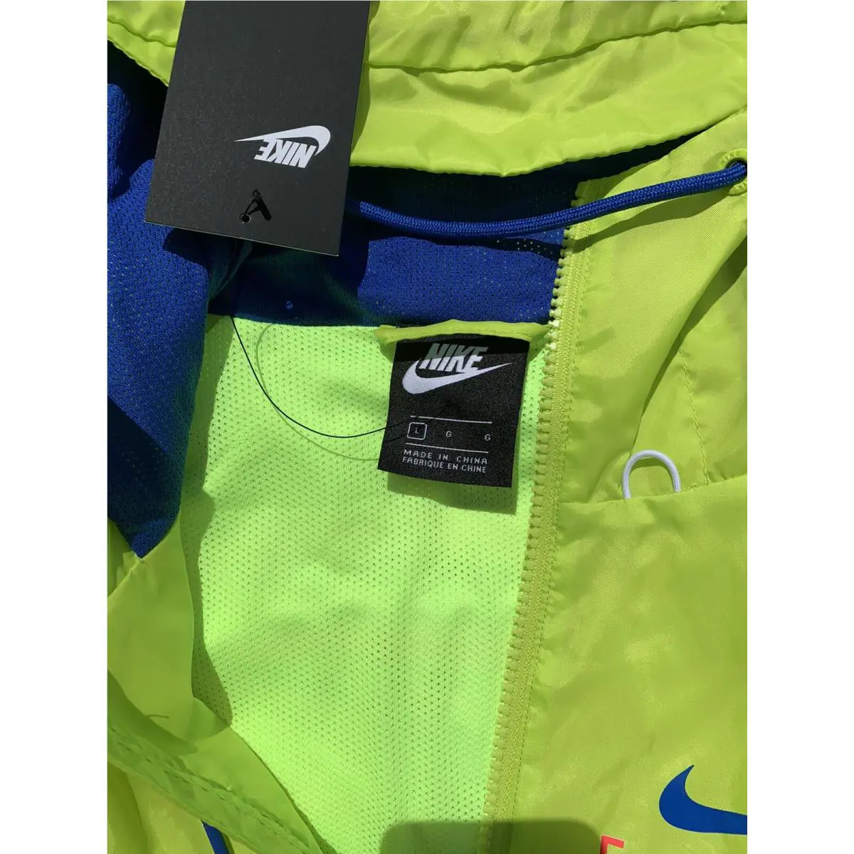Nike clothing - Nike Catching Air Windrunner - Catching Air Windrunner - Green Neon/Multicolor (UPC: 194276163443) 1