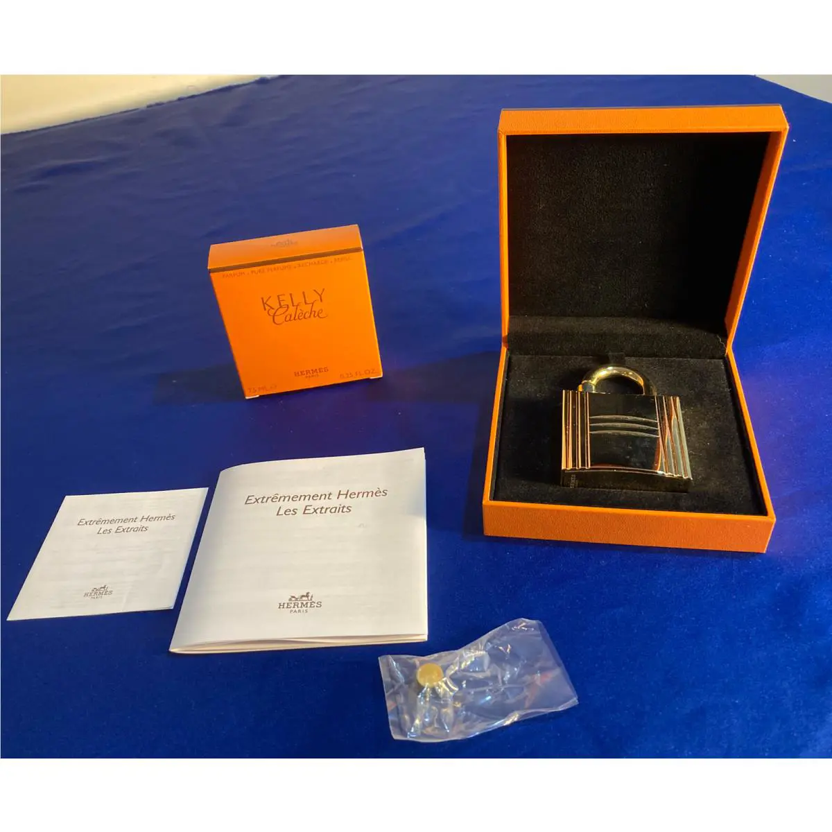 Hermes Exremement Les Extraits Refillable Lock Case Gold Tone in Box