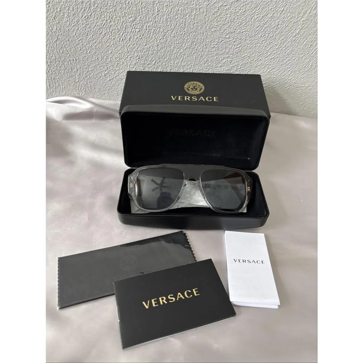 Versace VE 4436U 530580 Transparent Grey Plastic Pillow Sunglasses Blue Lens