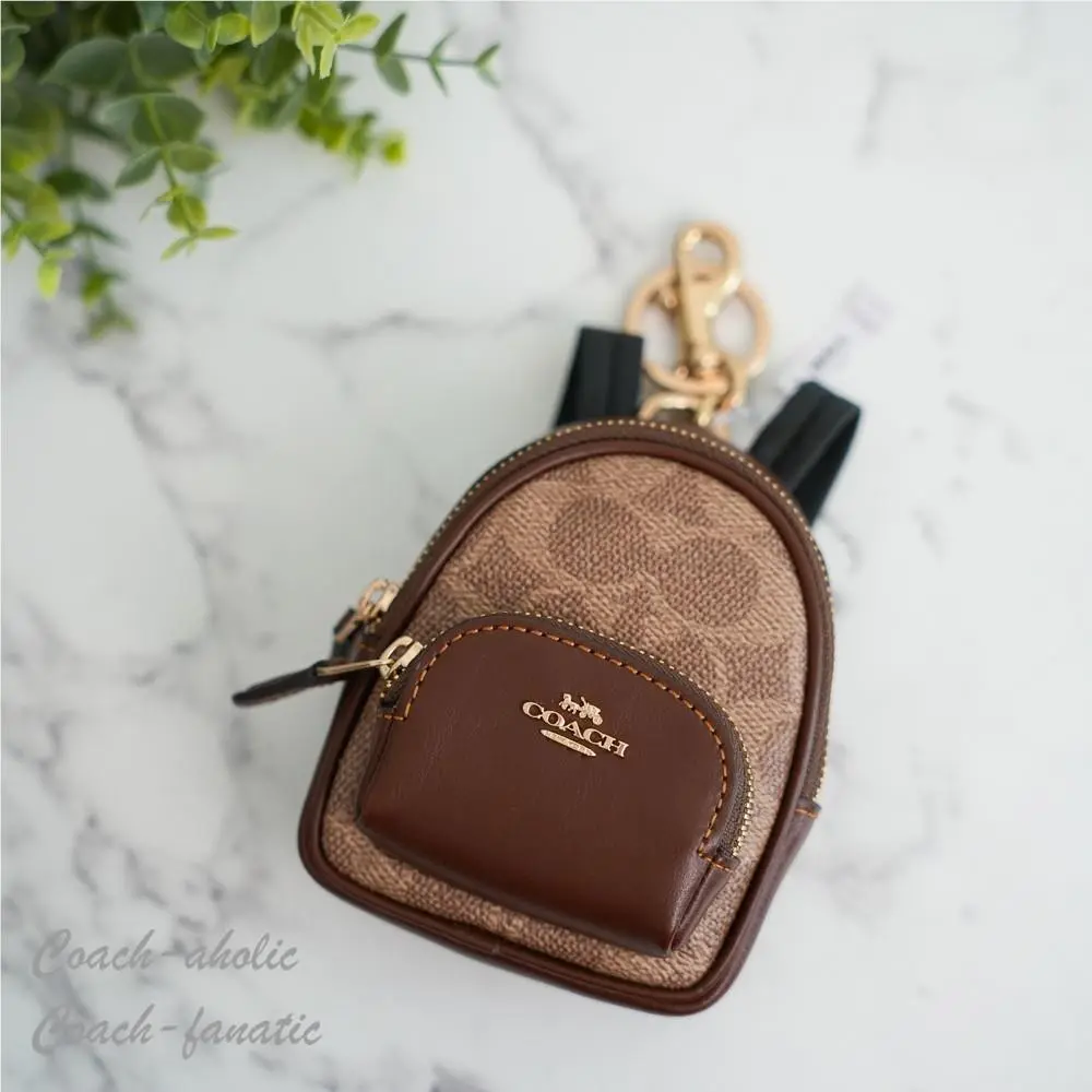 CX066 Mini Court Backpack Bag Charm In Signature Canvas Tan/brown by Coach