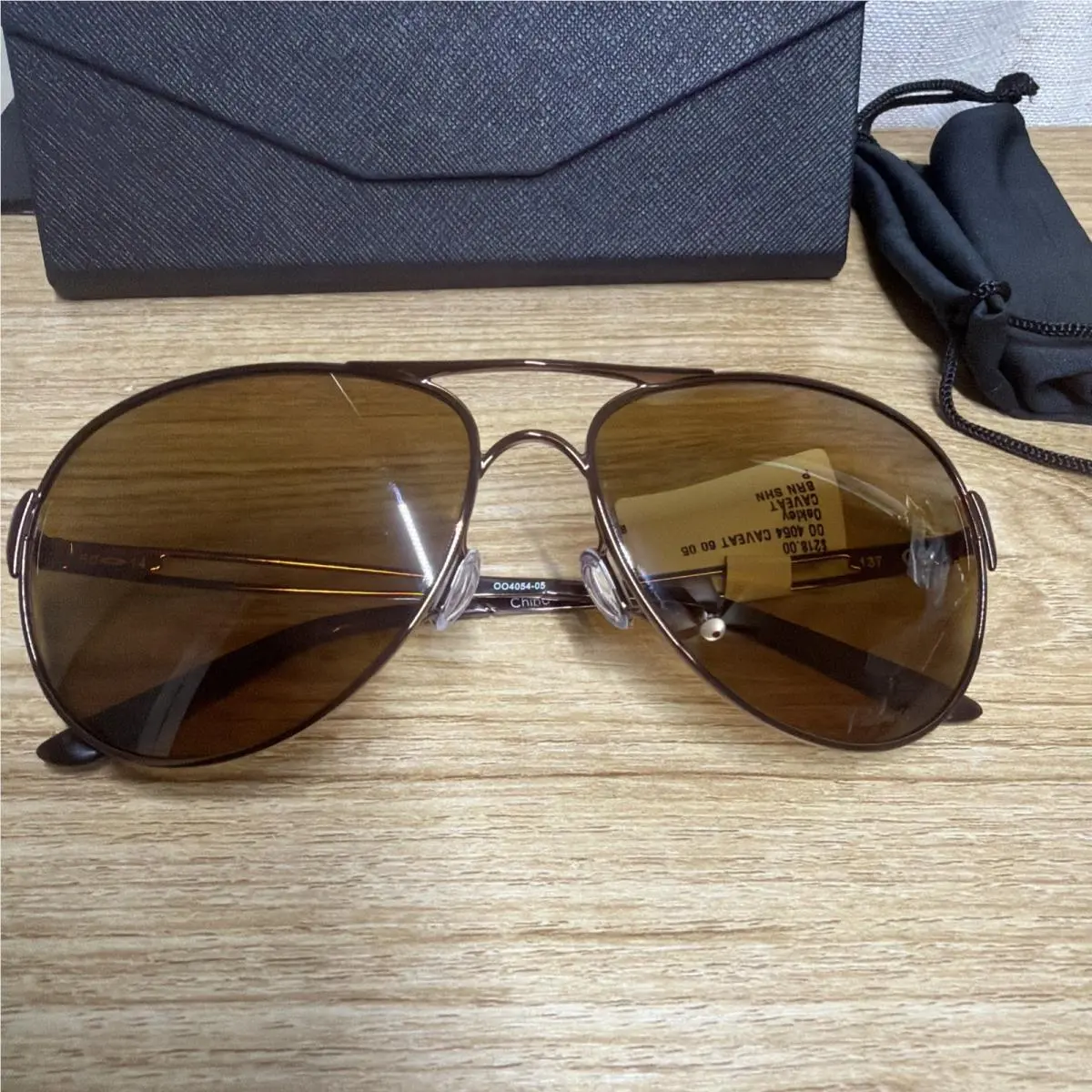 Womens Caveat Sunglasses Brunette - Polarised Bronze Lenses Generic /case by Oakley