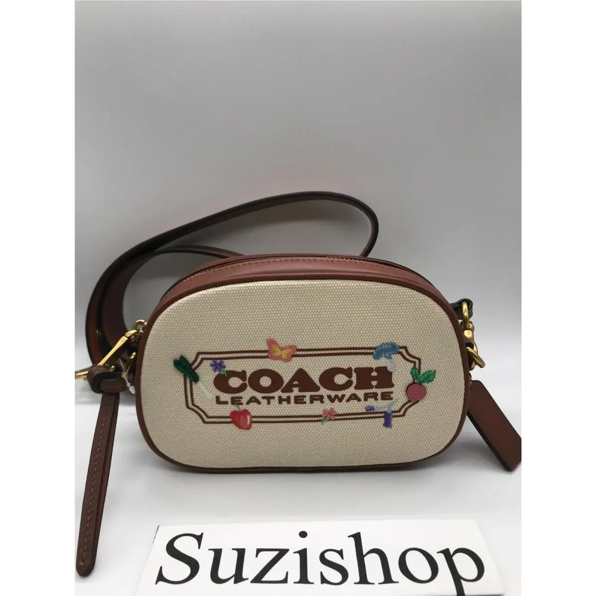 Coach Signature Embroidered Canvas Badge Natural Brass Camera Crossbody Bag