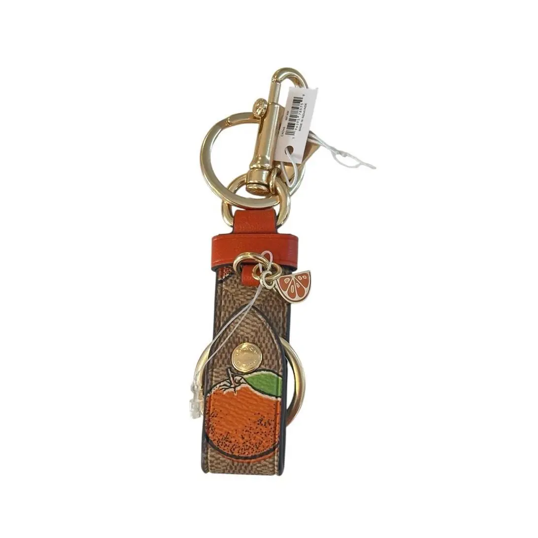 Coach Trigger Snap Bag Charm In Signature Canvas with Orange Print