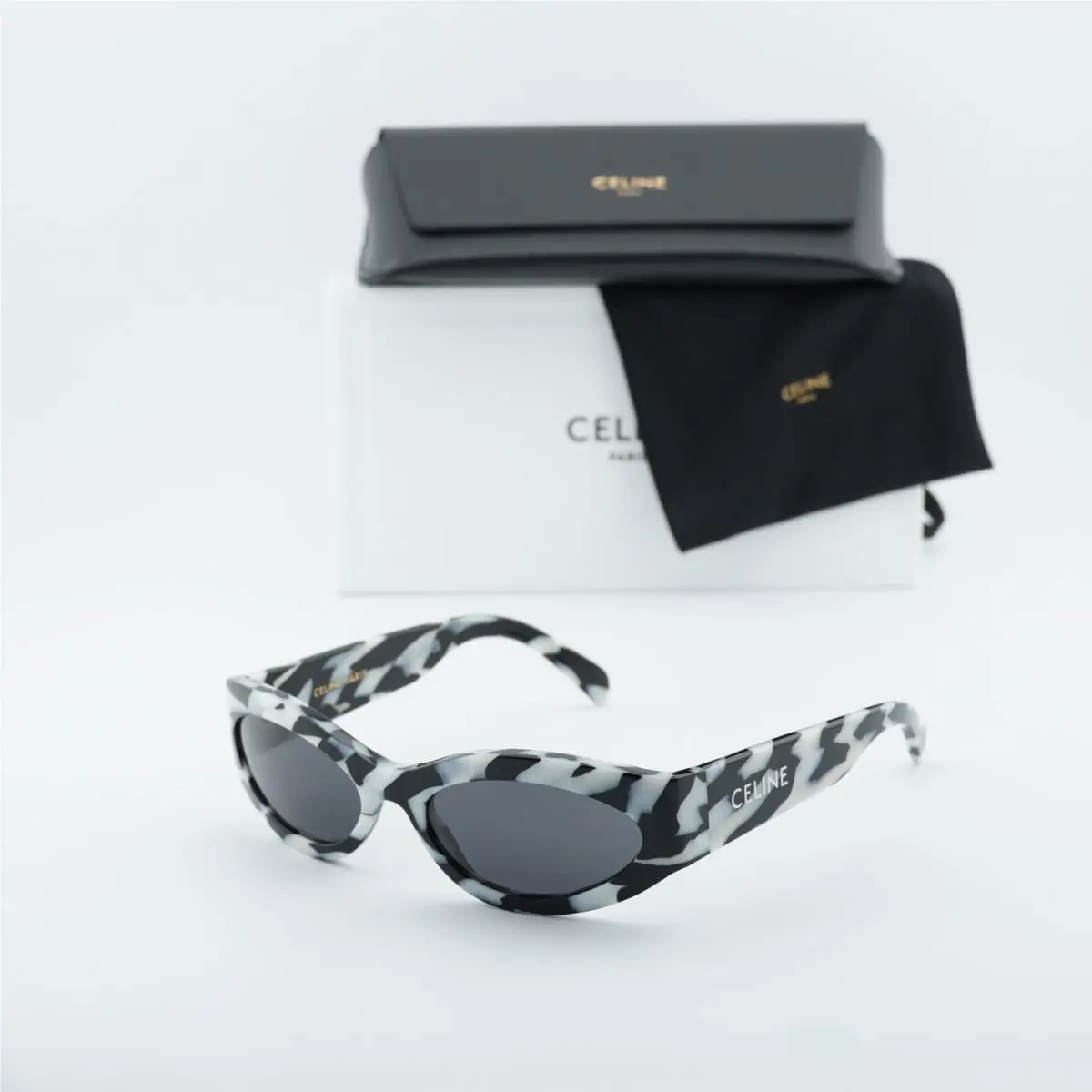 CL40288I 04A Black and White Zebra/grey 56-18-130 Sunglasses by Celine