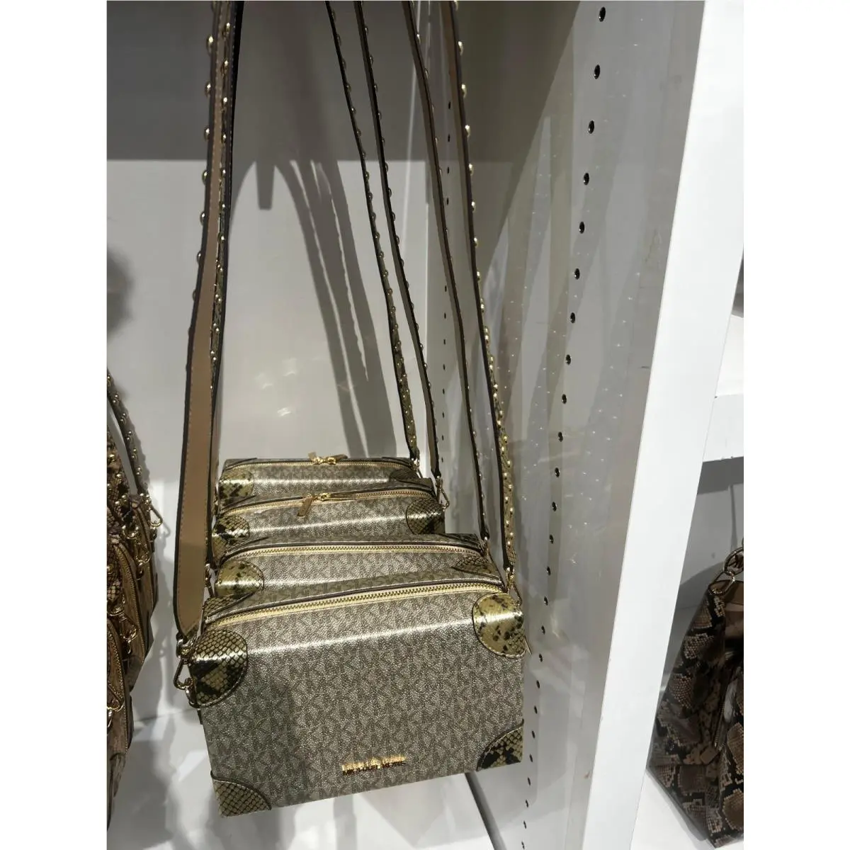Michael Kors Jeanie SM Metallic Snake Embossed Trunk Crossbody Bag Pale Gold