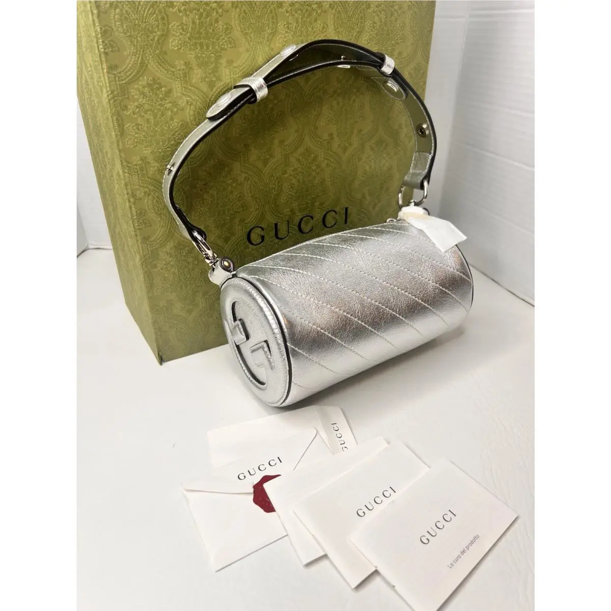 Gucci Blondie Silver Shoulder Medium Size Handbag with Cylindrical Design