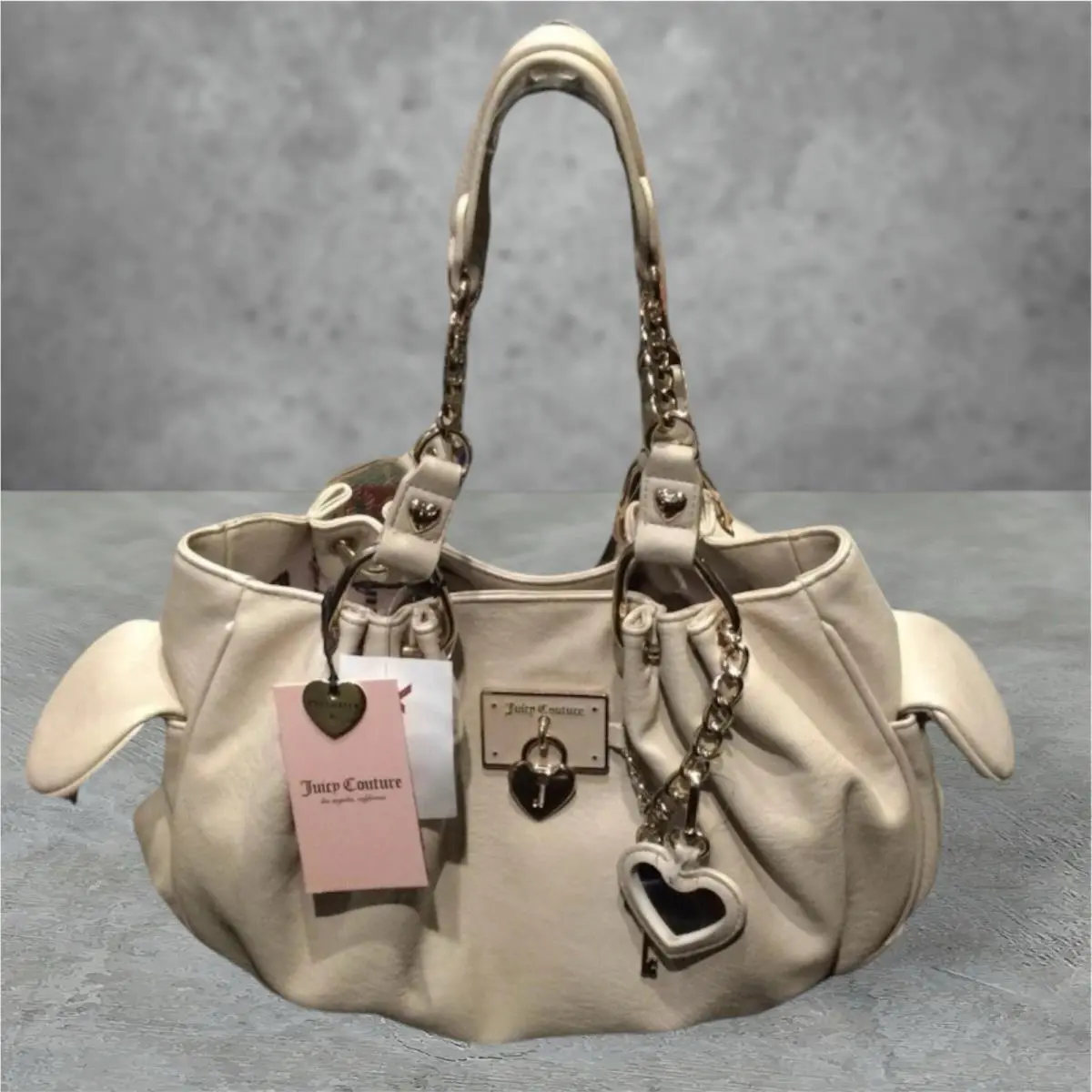 Juicy Couture Sandstone Beige Rolling On Juicy Lock Key Satchel