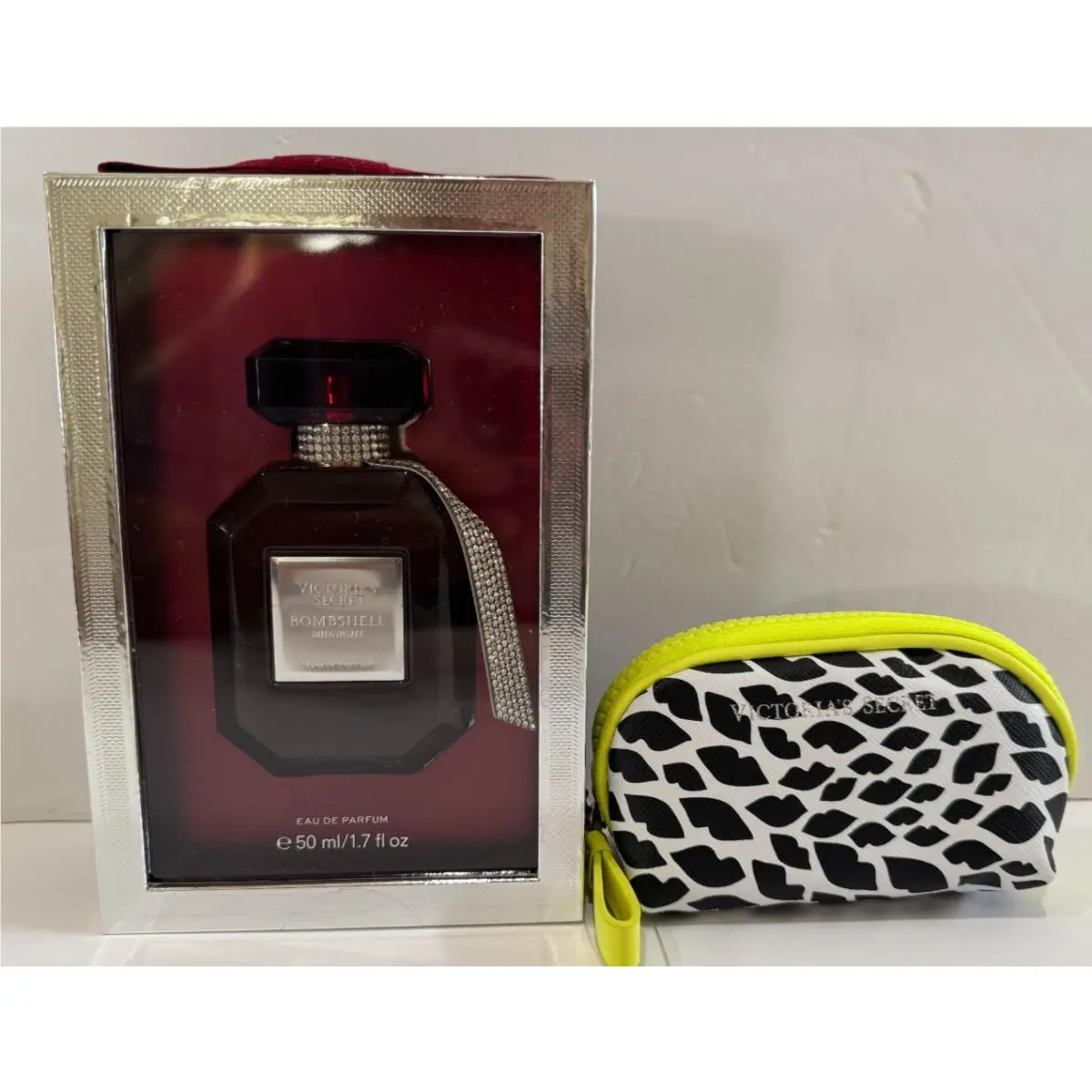 Victoria`s Secret Bombshell Midnight Perfume Eau De Parfum 1.7 fl oz Free Bag by Victoria's Secret