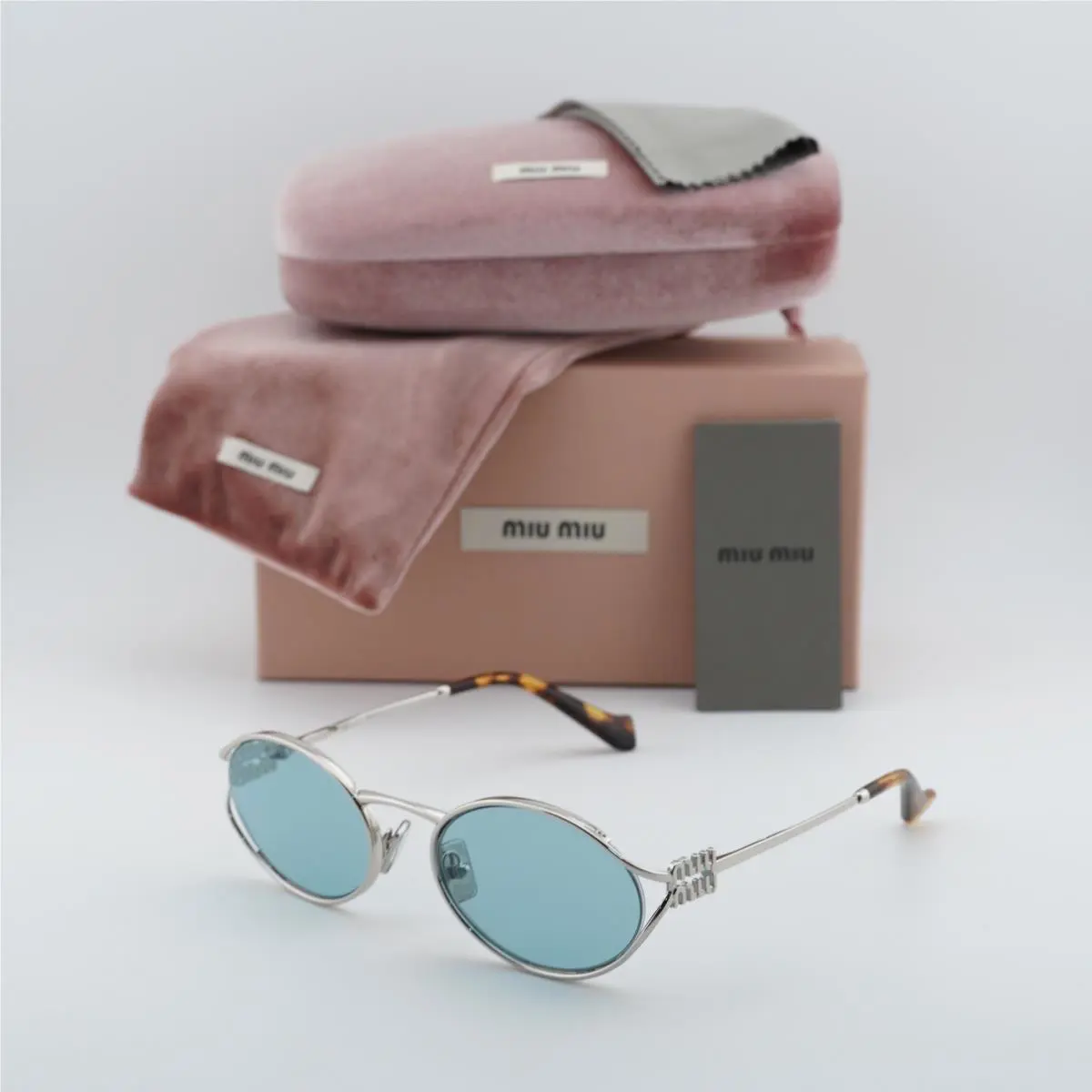 Miu Miu MU52YS 1BC20R Silver/blue 54-21-125 Sunglasses