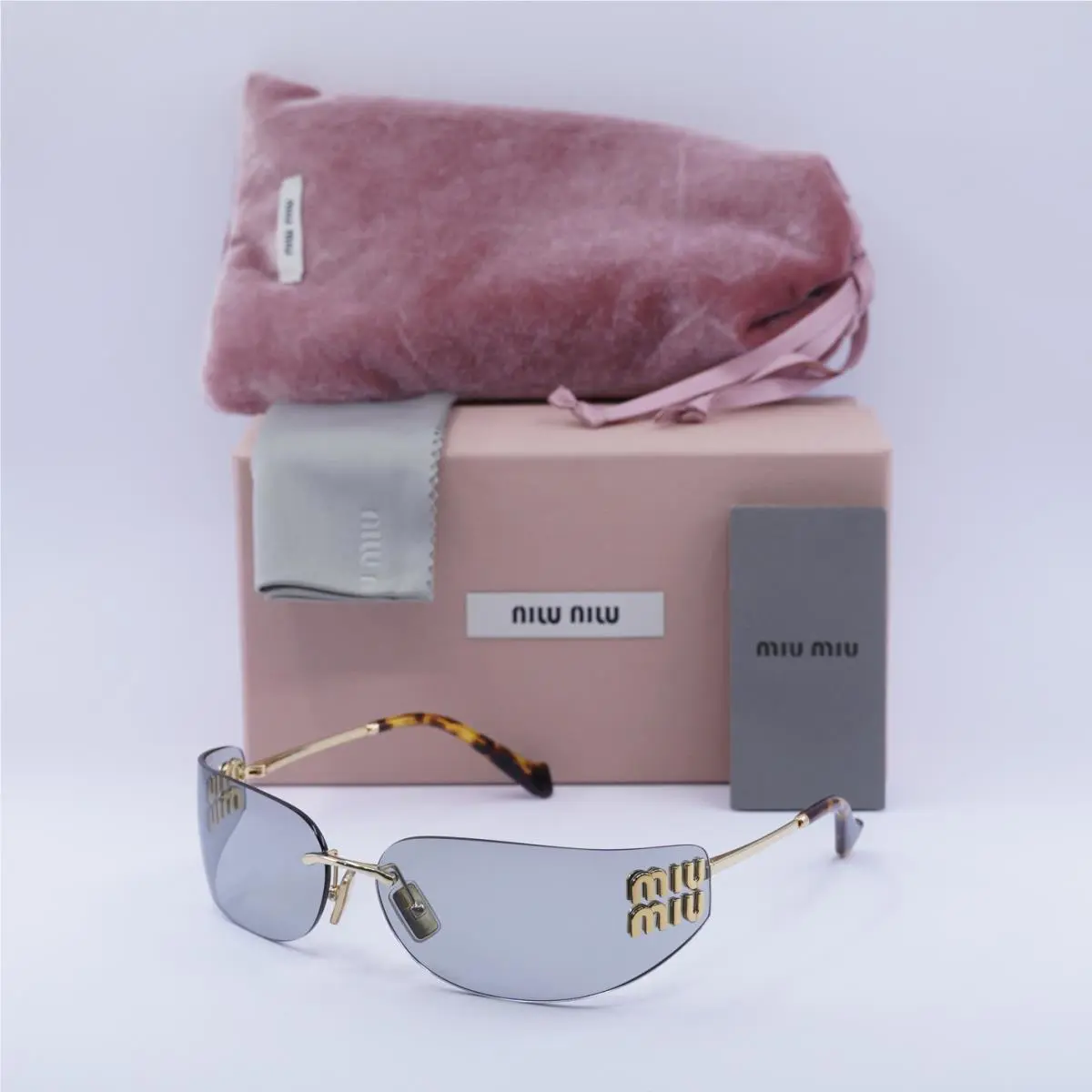 Miu Miu MUA51S 5AK50K Gold/light Grey 75-14-110 Sunglasses