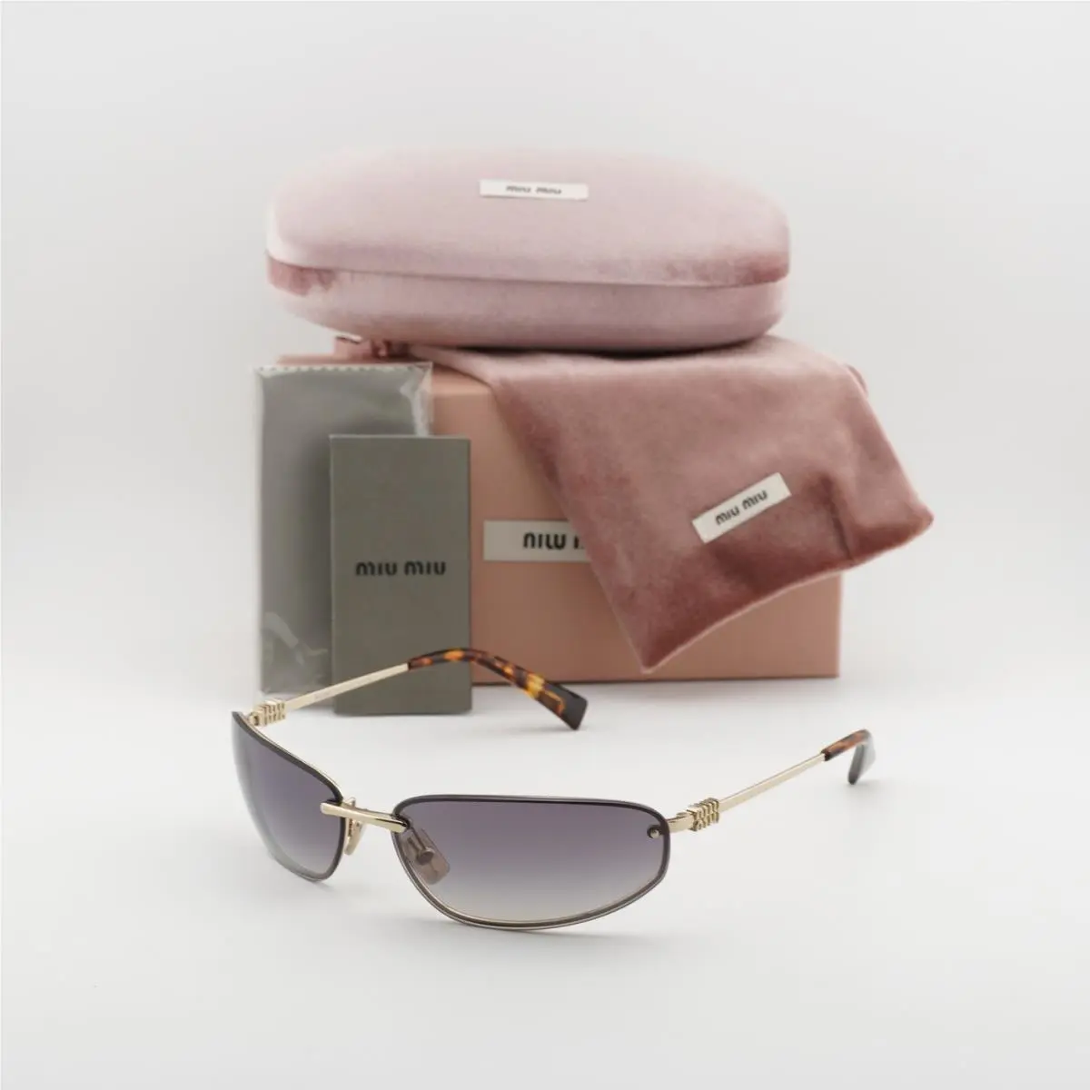 MUA50S ZVN30C Pale Gold/blue Mirror Silver Gradient 68-15-130 by Miu Miu