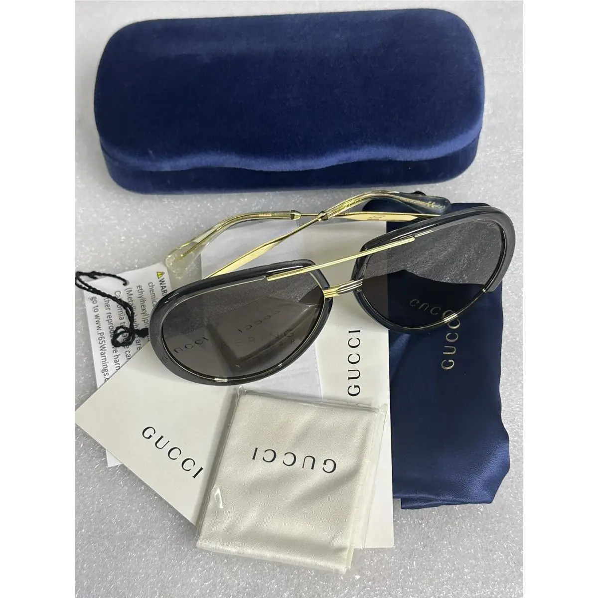 Gucci GG0904S Black Gold Frame 001 Sunglasses Gray Lens GG 0904 61-13-145