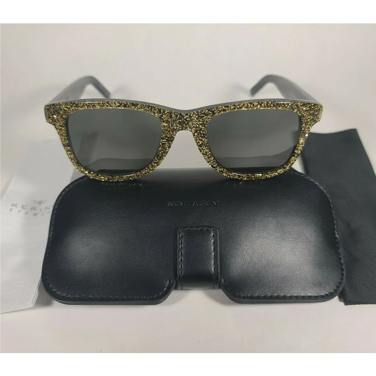 Saint Laurent SL51 008 Women`s Sunglasses Black Gold Glitter Frame Gray Lens by Yves Saint Laurent