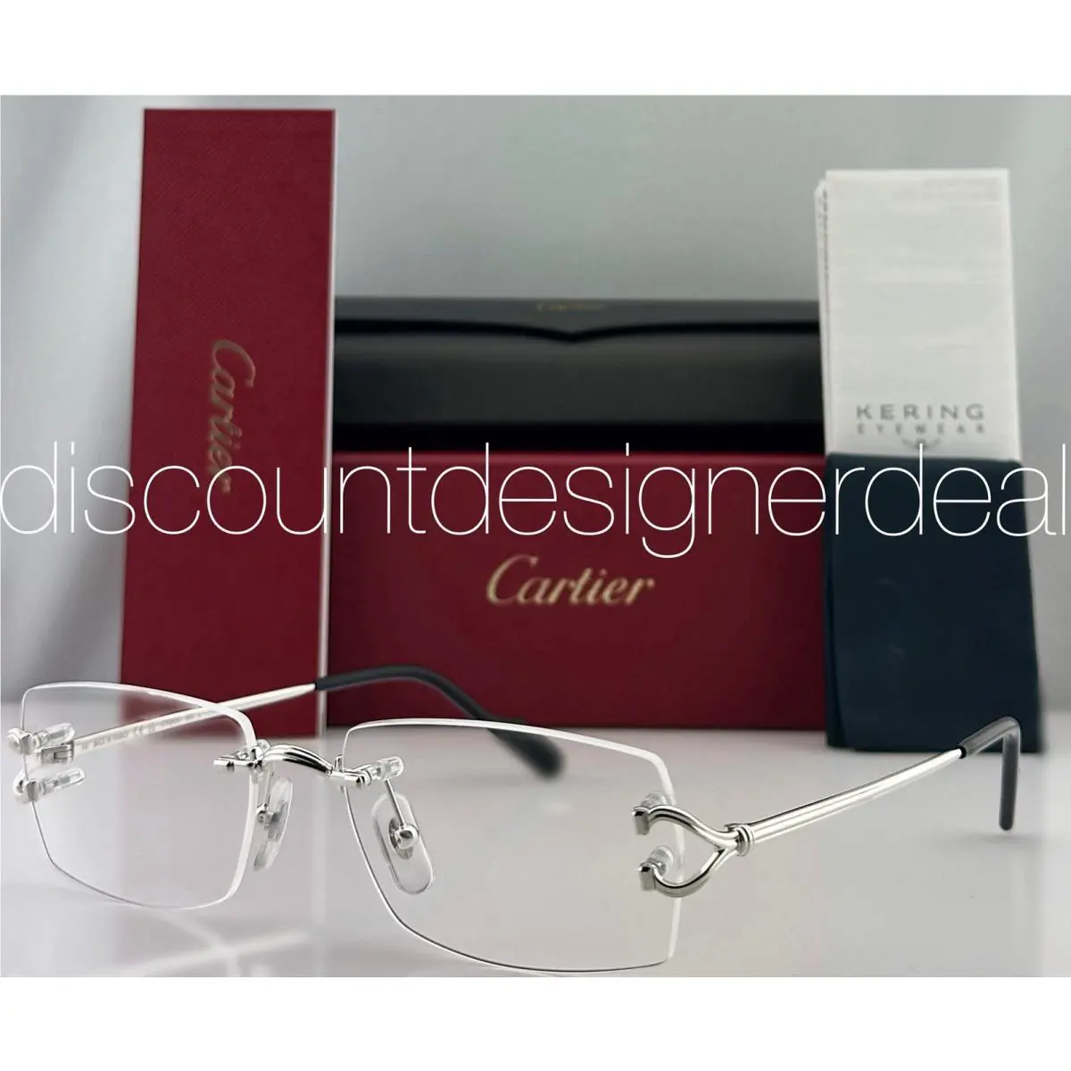 Cartier C Decor Rimless Eyeglasses Silver Frame Clear Lens 56mm CT0563O 002