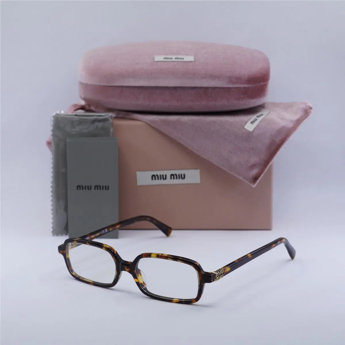 Miu Miu MU11ZS 14L08N Havana Honey/clear Blue Light Block 51-16-140