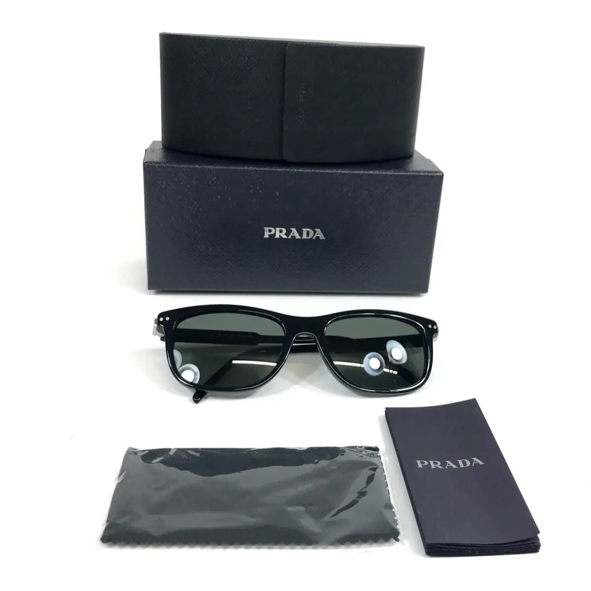 Prada Sunglasses SPR18Y 1AB-03R Polished Black Frames Gray Polarized Lenses