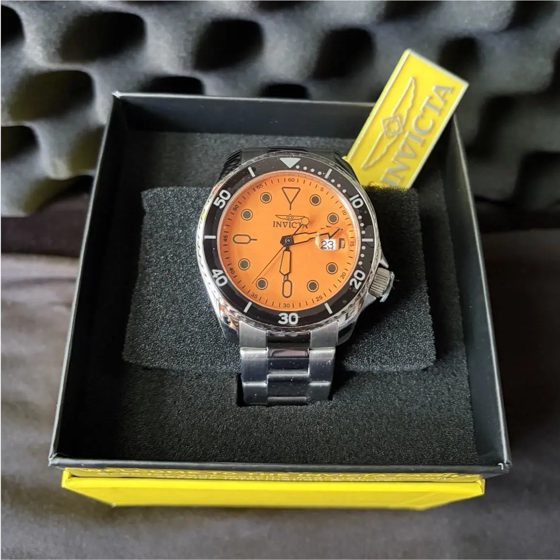 Invicta Men`s Diver Quartz Wristwatch Orange Dial Black Bezel Steel Band Box