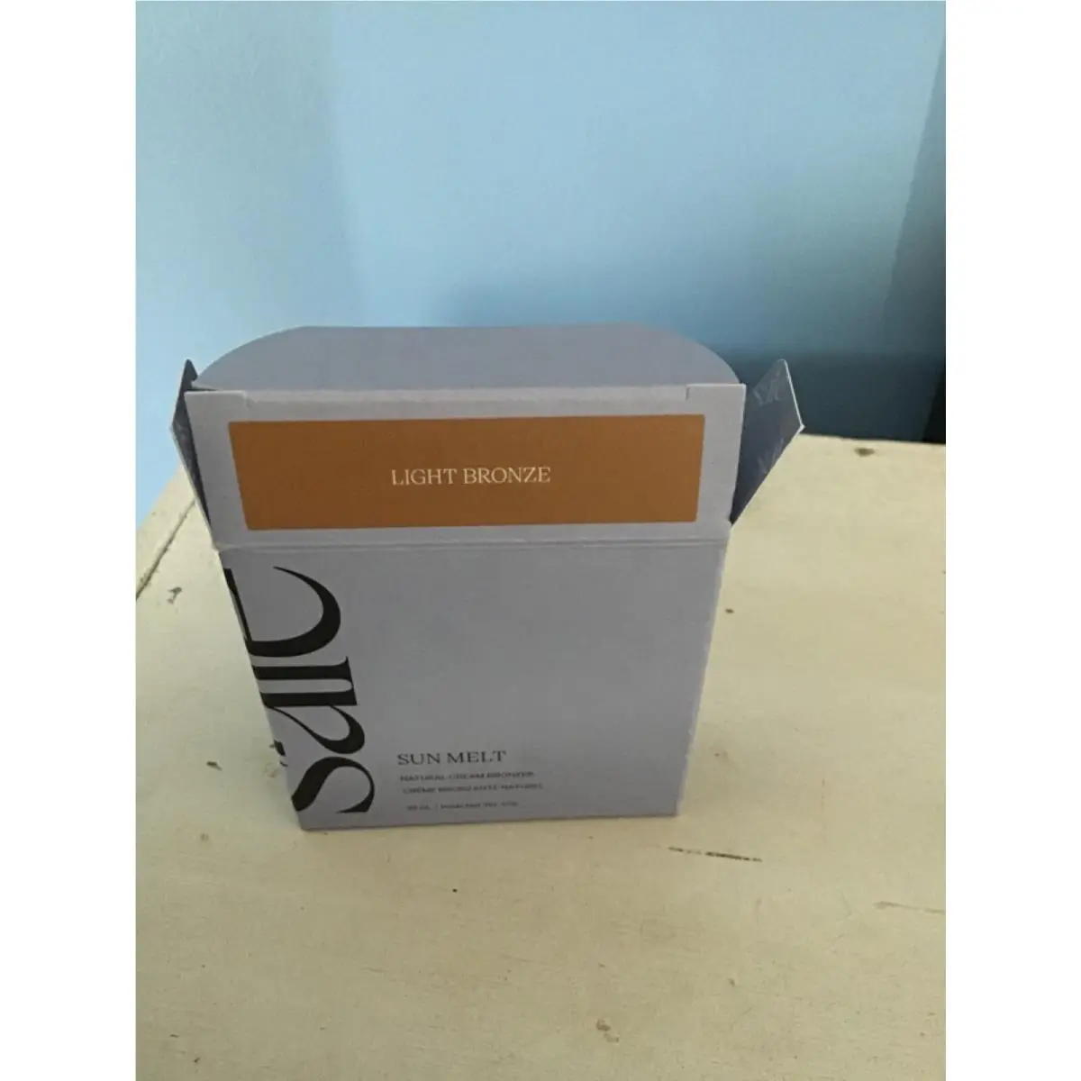 Sun Melt Natural Cream Bronzer Pick 1 Cruelty-free Light Bronze peach shade for light tone by Saie