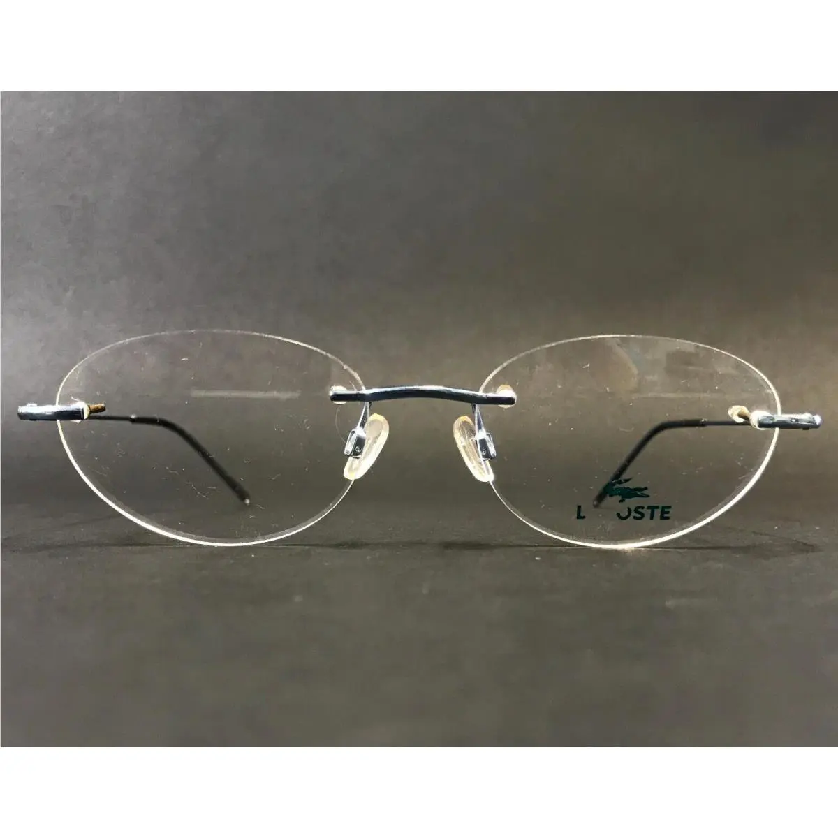 Lacoste Eyeglasses Frames 8024 F1219 Metal Blue Rimless Oval 52-15-135