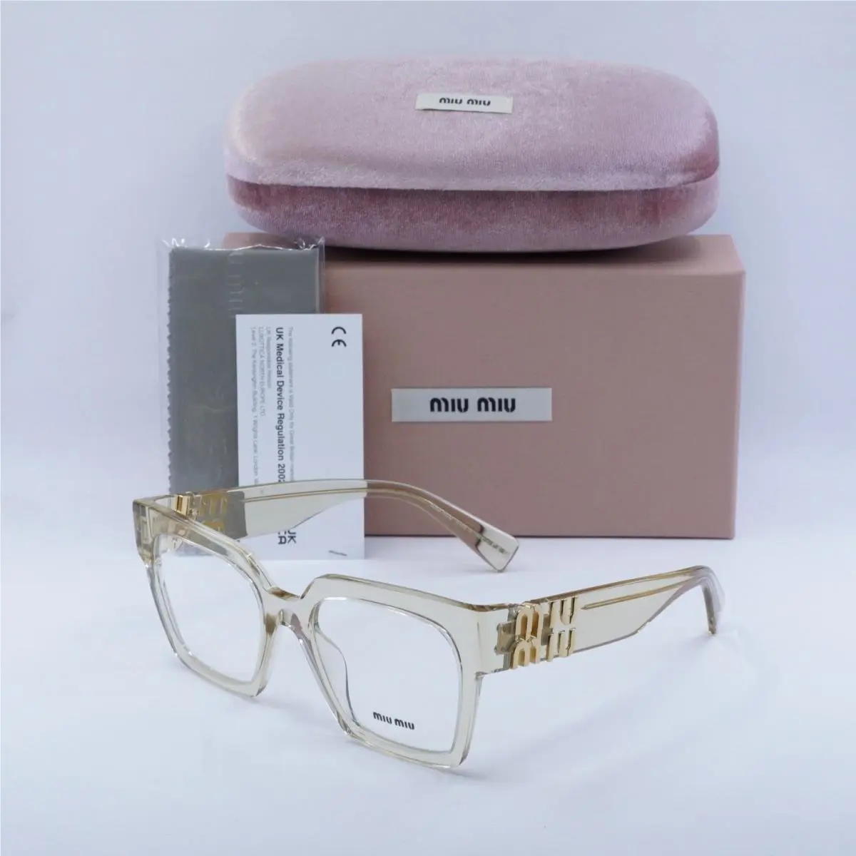 Miu Miu MU04UV 11T1O1 Sand Transparent 52mm Eyeglasses