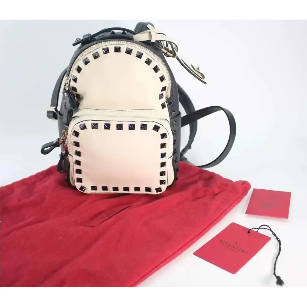 Valentino Garavani Rockstud Leather Mini Backpack Bag In Black-cream
