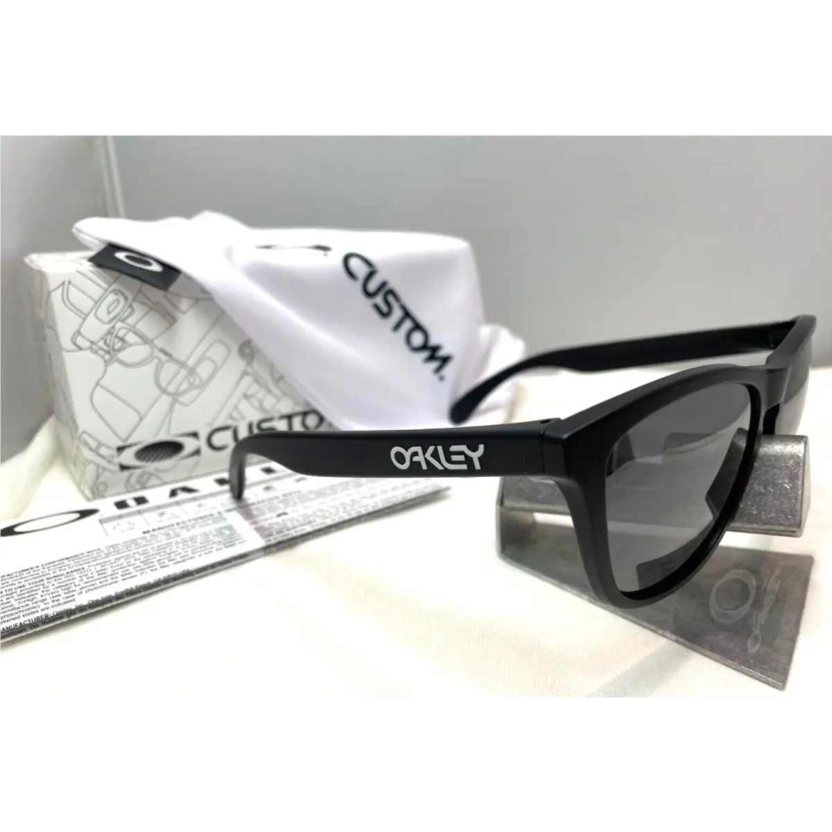 Frogskins Custom Matte Black Iridum Polarized White Text Sunglasses by Oakley