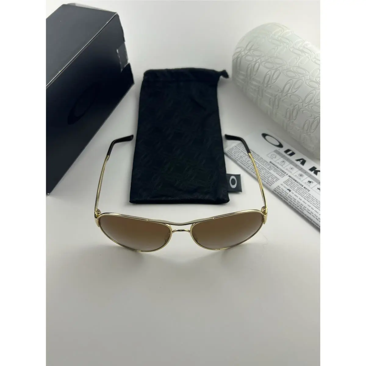 Caveat Polished Gold Dark Brown Gradient+box OO4054-07 Womens by Oakley