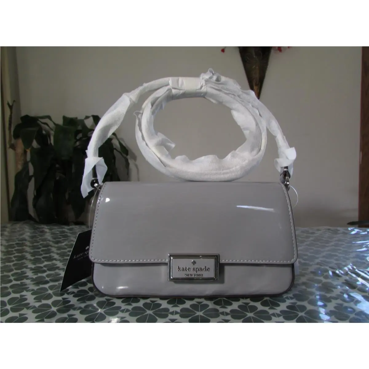 Reegan Patent Mini Flap Crossbody KM567 Pavement or Tutu Pink Pavement by Kate Spade