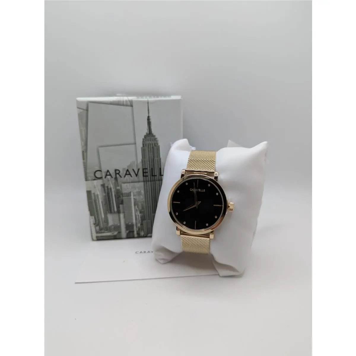 44L256 Womens Gold Band Black Dial Water-resistant Round Wristwatch by Caravelle