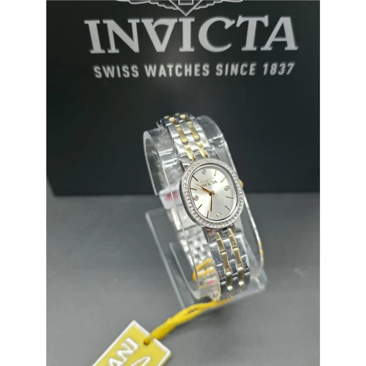 Women`s Angel Quartz 3 Hand Silver Dial Gold Highlights Watch 48136 by Invicta
