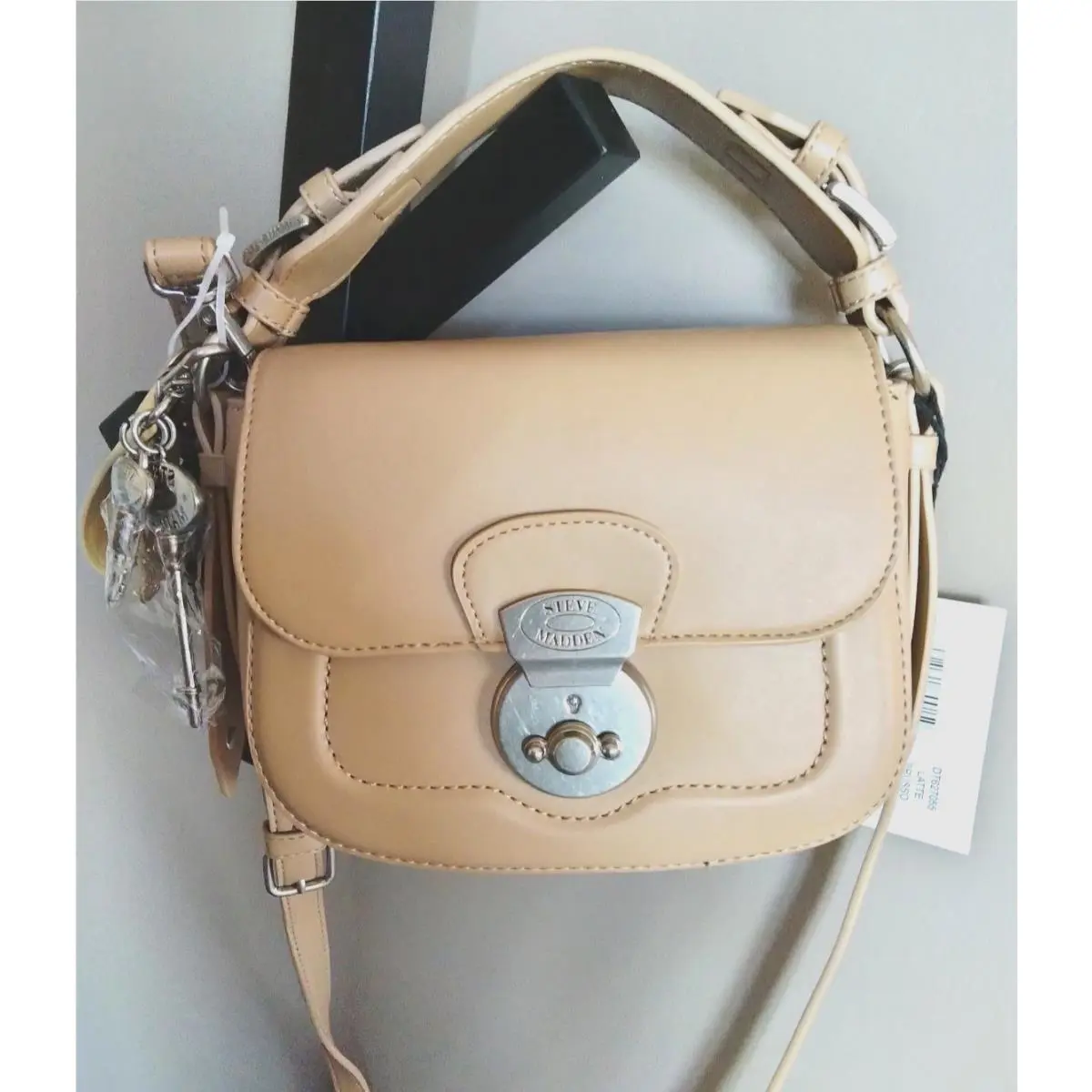 Steve Madden Brusso Saddle Lock Crossbody Bag In Latte Tan with Charms