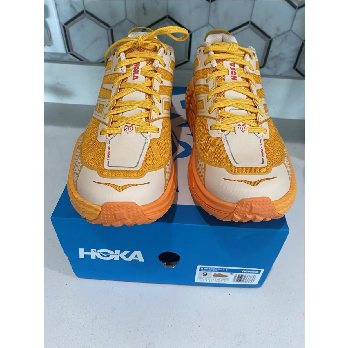 Hoka shoes - dawn Light/Sun Coral 0