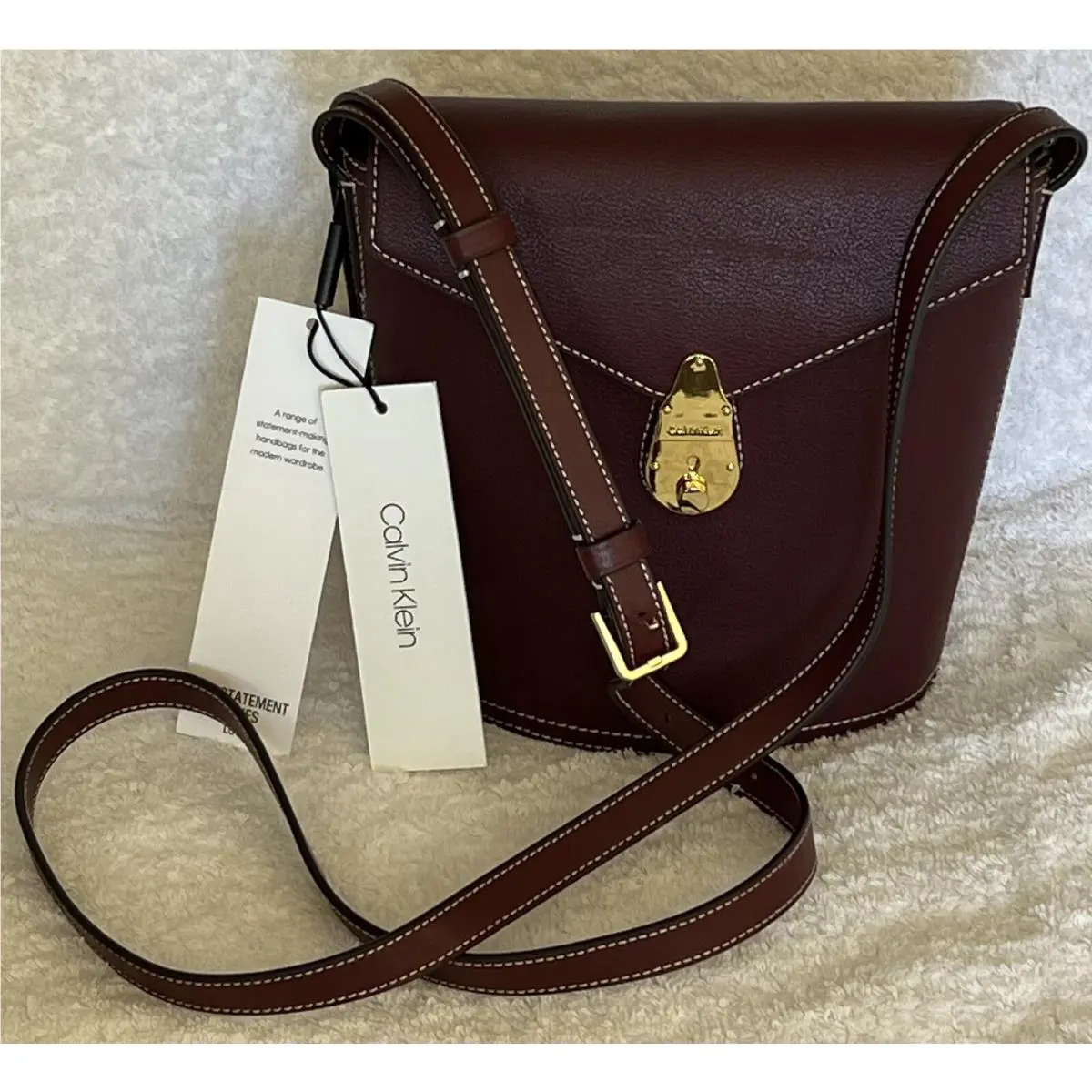 Calvin Klein Statement Series Lock Flap Merlot Leather Bucket Crossbody Bag