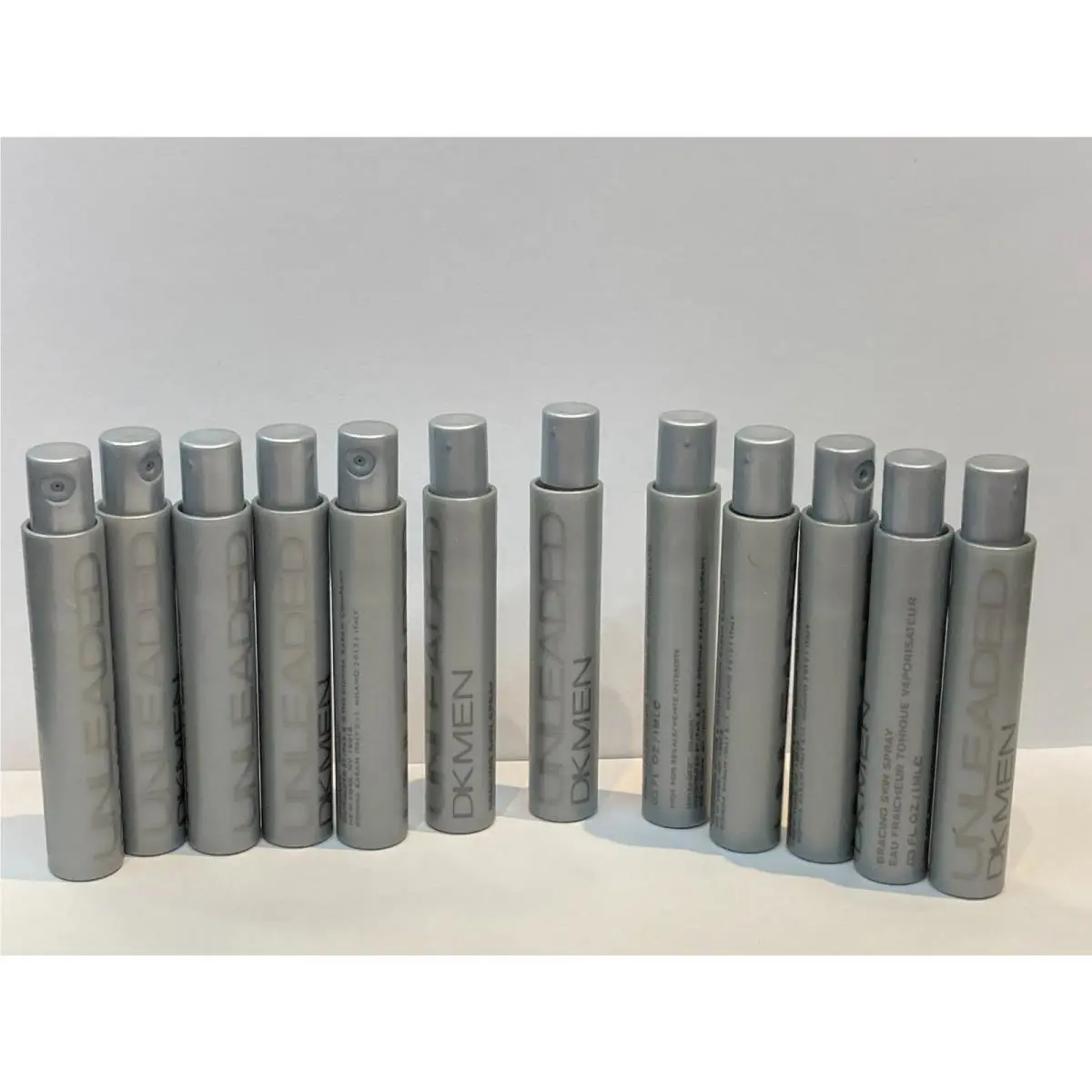 DK Men Unleaded by Donna Karan York Lot 12 X 0.03 FL oz / 1 ML Bracing Spray