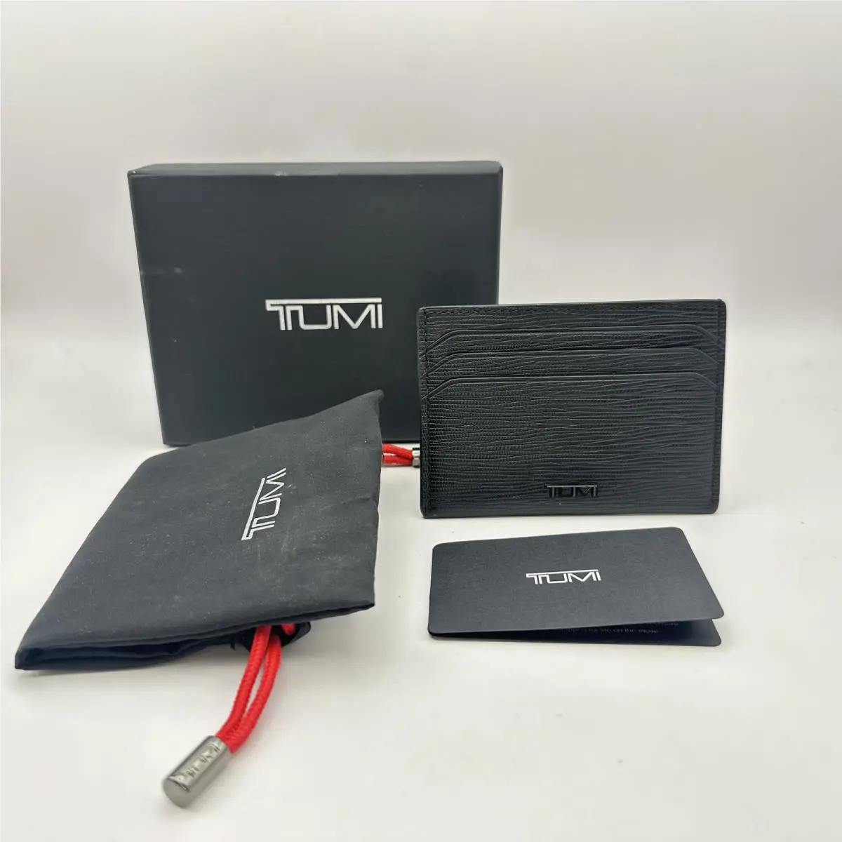 Tumi Mens Nassau Slim Card Case Leather Embossed Black