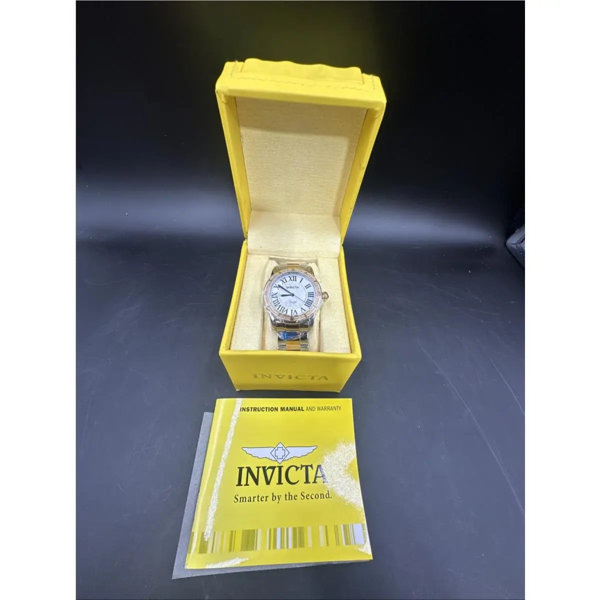 Invicta Angel Women`s 12-Diamonds Bezel 38mm Two-tone Swiss Quartz Watch 14376 - Dial: Silver, Band: Gold, Silver, Two-Tone, Bezel: Gold