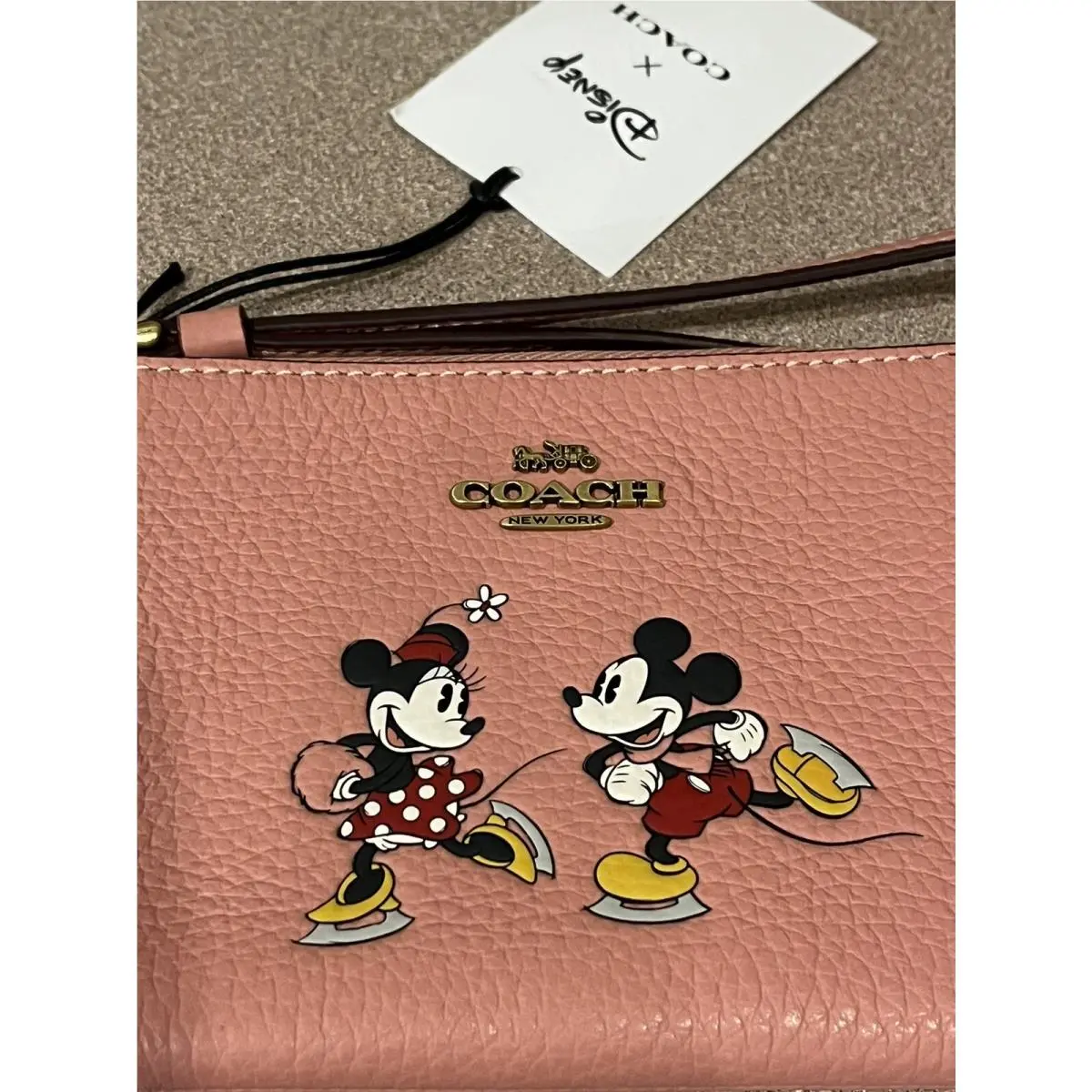 Coach Disney X Coach Corner Zip Wristlet with Ice Skate Motif Blush CN026