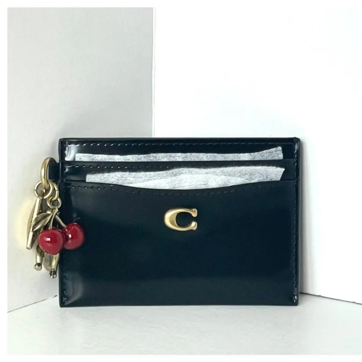 Coach Essential Card Case CCD81 Black Brass Spazzolato Rexy Cherry Charm