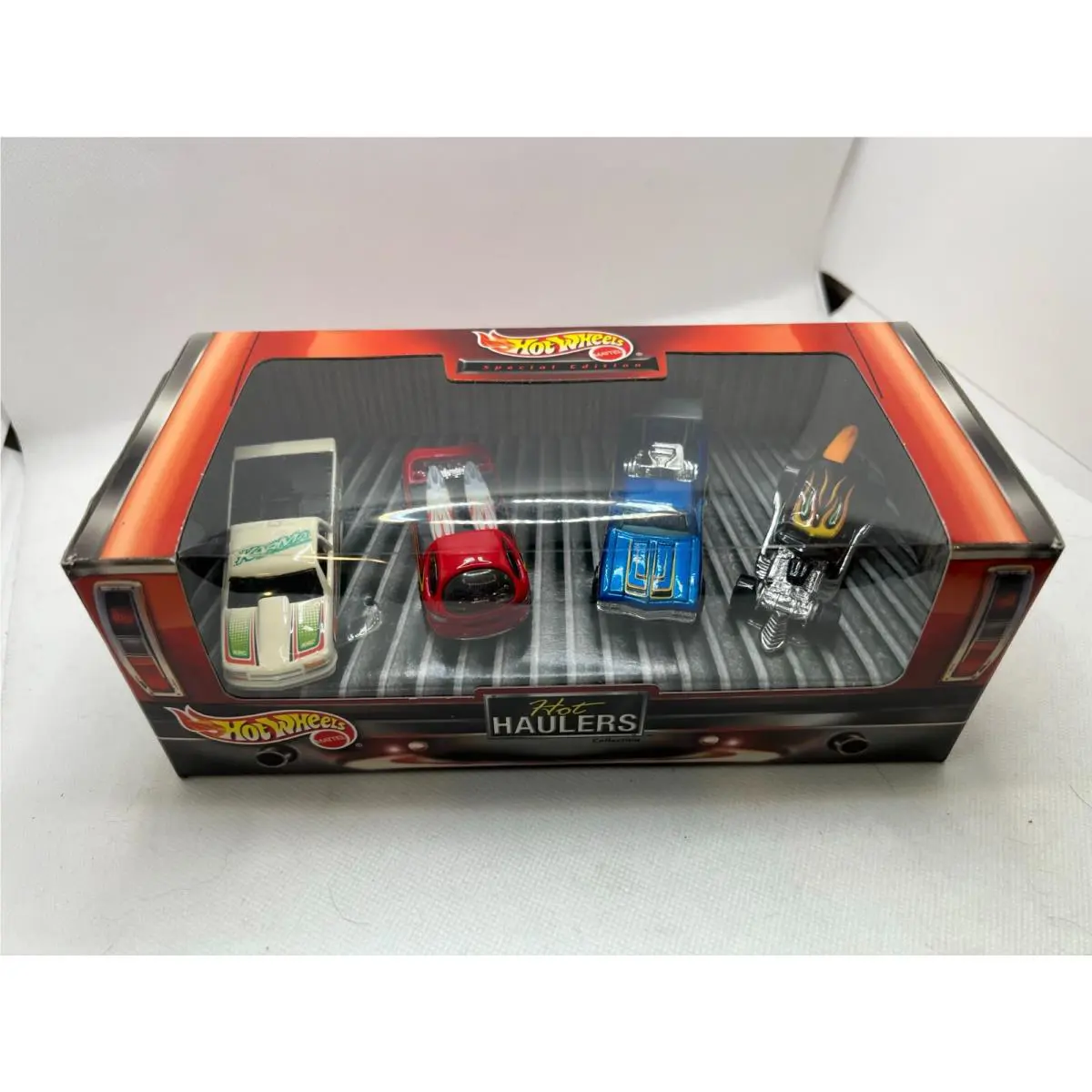 Hot Wheels Haulers 4 Car Set Chevy S10 Deora II Surf Crate 69 El Camino