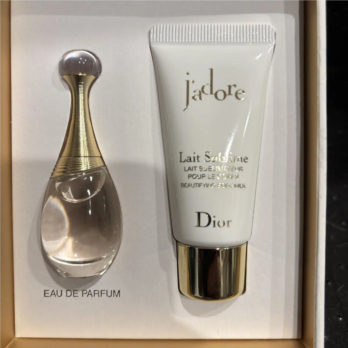 Dior J`adore Eau de Parfum Deluxe Mini 0.17 Oz. and a J`adore Body Milk 0.68 oz